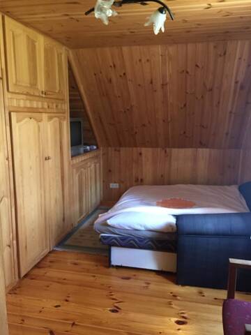 Фото номера Вилла с 2 спальнями Загородные дома Rupinskėliai г. Kazitiškis 8